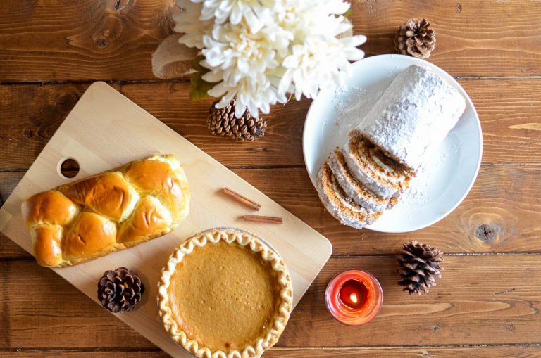 delectable baked goods placed on wooden surface
