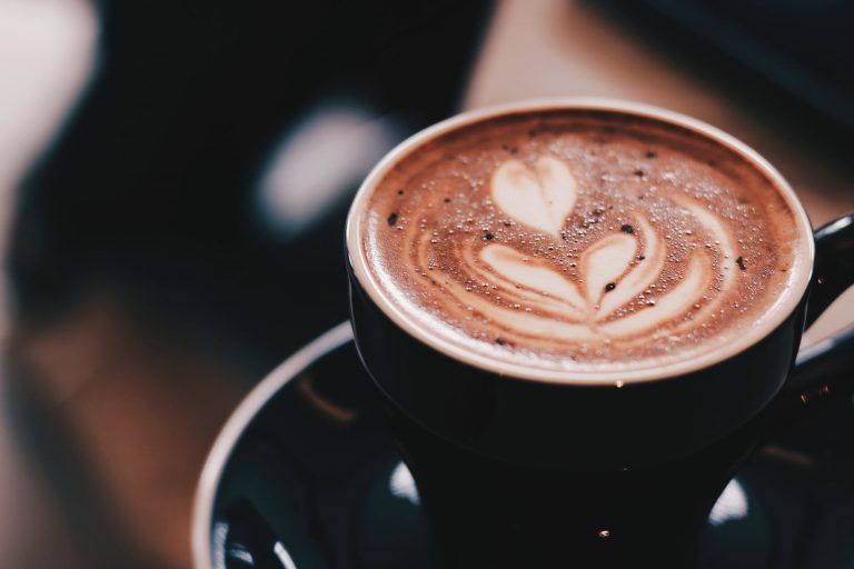 shallow focus photography of cafe late