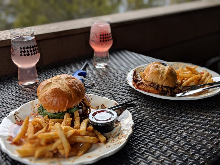 two cooked sliders and fries