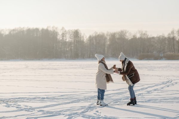 couple having fun doing ice skating