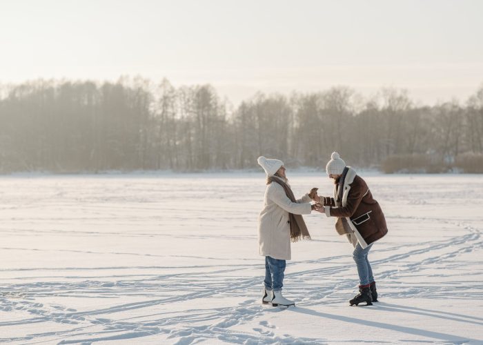 couple having fun doing ice skating