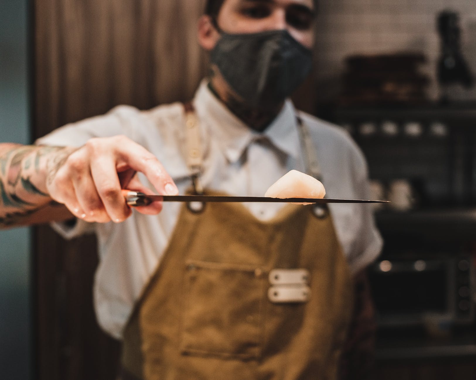 a person holding a sharp knife