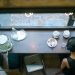 unrecognizable female sitting in cafe with coffee